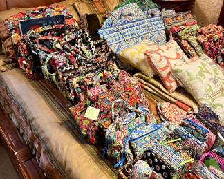 Large Vera Bradley bag collection. Please note, the family did pull the happy snails garment and duffle bags.
