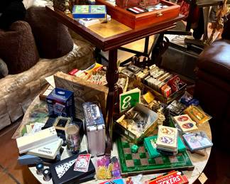 Large selection of playing cards, domino sets and chess boards