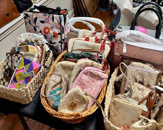 Coach wallets, coin purses and other storage