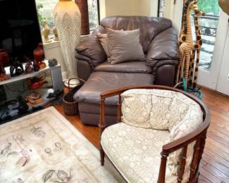 Leather lounge chair and ottoman, vintage barrel chair