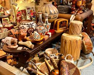 Native American pottery vases and artifacts all over the house