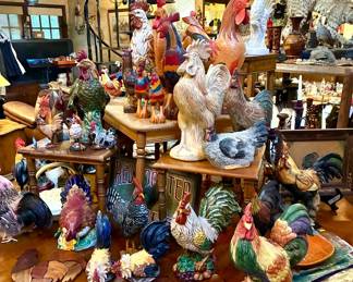 Large collection of roosters and hens in wood, ceramic and resin. Please note, the large round table in this photo is not for sale, the family is keeping it.