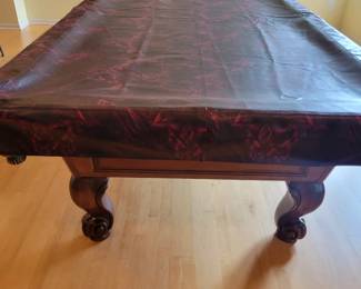A 9 ft Billiards / Pool Table by Peters Billiards. Comes with Cues and balls etc.