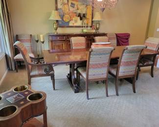Dining Set with 8 Chairs and extra table leaf.