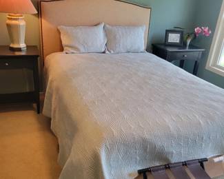 Queen Size Bed complete with bedding.