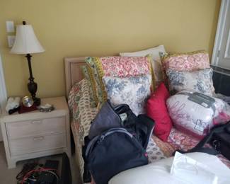 Full bed; nightstand; table lamp