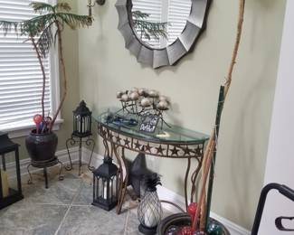 Foyer table; large wall mirror; plants & pots
