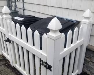Vinyl fence; rolling trash bins