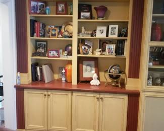 Built-in cabinetry; photo frames & decor