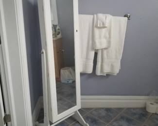 Standing mirrored jewelry armoire