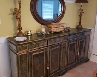 Stunning mirrored breakfront; table lamps; large circular mirror