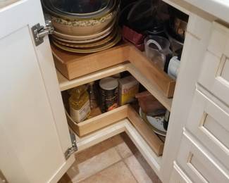 Kitchen cabinets feature a lazy Susan