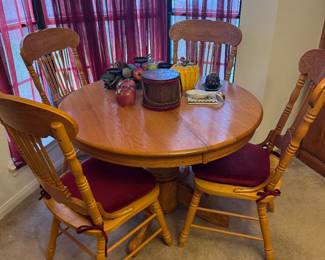 Smaller wooden round dining table