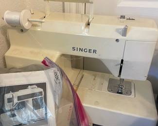 Singer with original paperwork