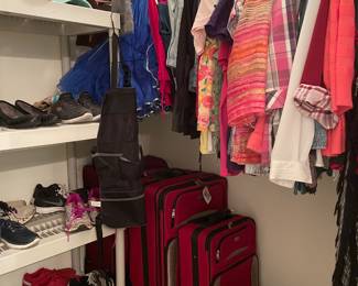 Women’s clothing, suit cases