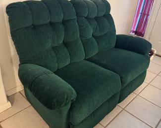 Love Seat Dark Green Fabric. Has matching full-size couch.
