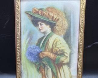 Miniature brass frames w/ artwork. 