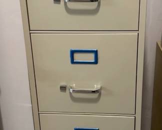 Beige 4-Drawer Metal Filing Cabinet ($30)