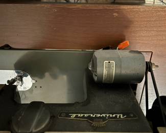 Sewing machine cabinet/table w Vintage Universal Zig-Zag machine. $ 100. 36.5”- 64.5” w 19” d 30”t