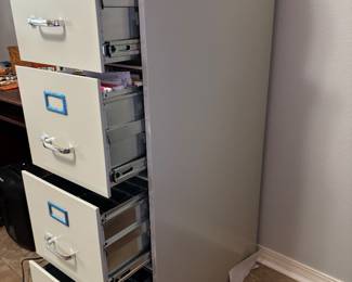 Metal 4 drawer file cabinet w keys $150 15” w 26.5” d 52” t