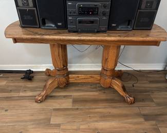 Oak Sofa table w claw feet $ 120.