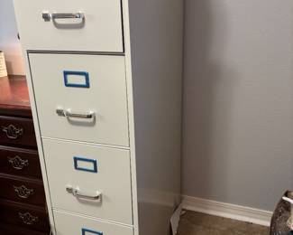 Metal 4 drawer file cabinet w keys $150 15” w 26.5” d 52” t