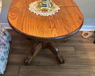 (2) Oak Oval side tables w claw feet $90 each. 29”L 24” w 23”t
