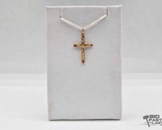 802  10kt Gold Crucifix Pendant 0.4g