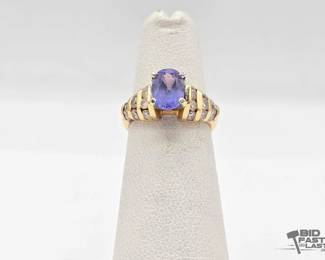 716 14kt Gold Ring with Diamonds and Tanzanite 4.4g