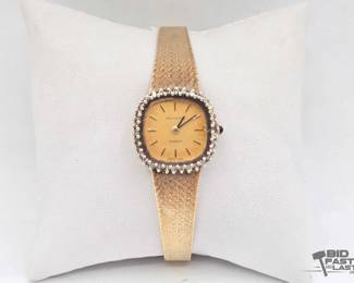 1103  14kt Gold Movado Watch with Diamonds