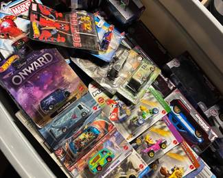 Lots of hot wheels in bins