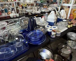 stock pots, roasters, blue baking dishes, enamelware