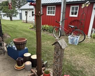 gas cans, hall, tree, birdhouse, planters