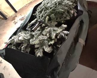 Large Christmas tree in storage bag.