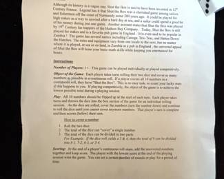 Shut the box game history and instructions.