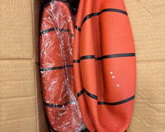 Box of 6 practice basketballs with pump.