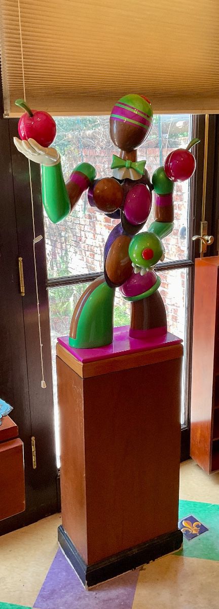 Olive man signed sculpture