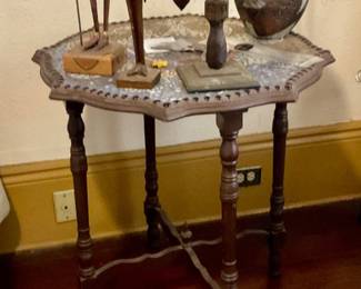 Spanish figures on tile topped table