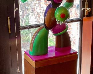 Olive man signed sculpture