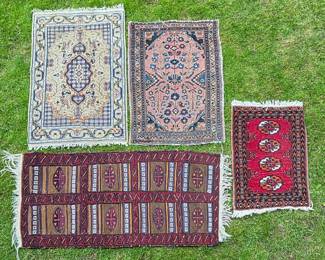 Assortment of hand tied rugs