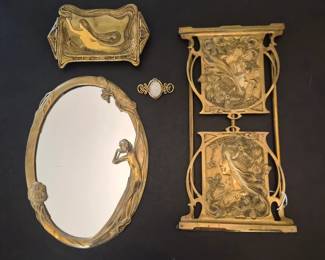 Art Nouveau style. Fine expandable brass bookend