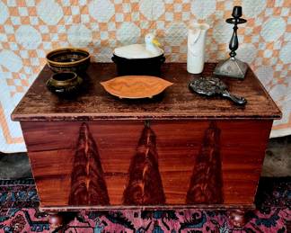 Mid 1800's grain painted blanket with secret compartment, bun feet.