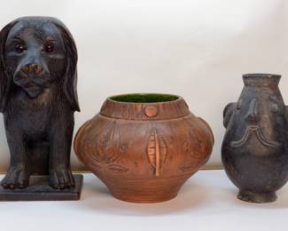 Black Forest carved dog container, vase, and old face jar.