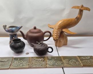 Artist tiles, Chinese teapots, hand carved whale scupture