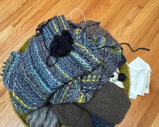 Assorted Hand-Knitted Projects and Yarn Basket