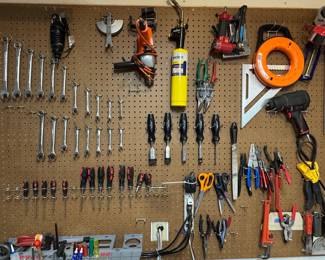 Assorted Workshop Hand and Power Tool Collection with Pegboard Organization