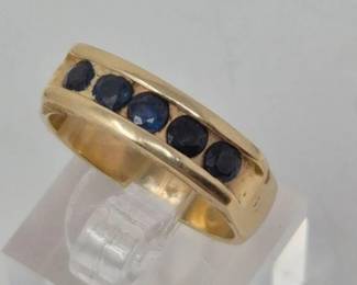 63 14kGoldChannelSetDeepBlueSapphireRing69g