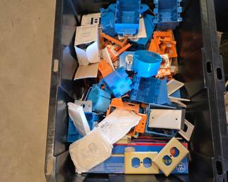 electrical boxes, wall plates, and mounting brackets used for wiring a home.