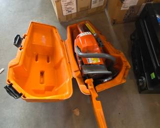  Husqvarna gas-powered chainsaw 