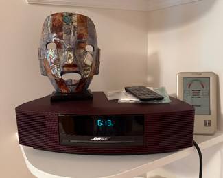 Living Room: Bose radio, shell mask